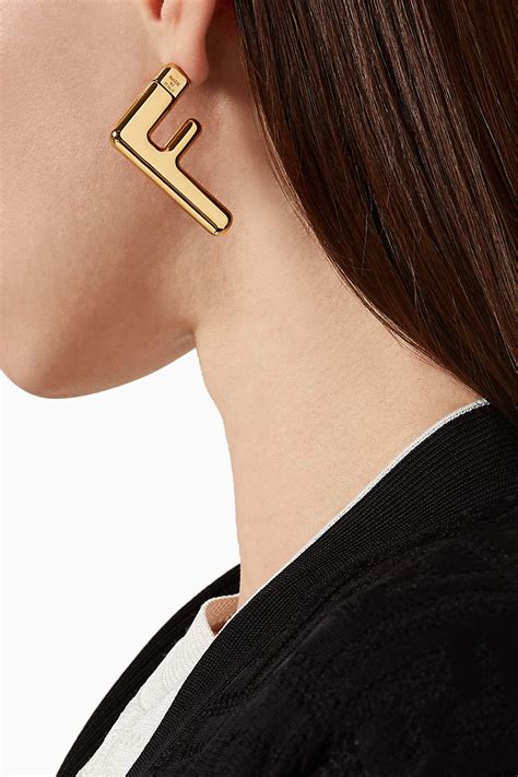 fendi f stud earrings|Fendi pierced earrings.